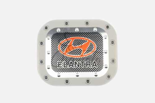 Наклейка на крышку бака ELANTRA (15х13см)